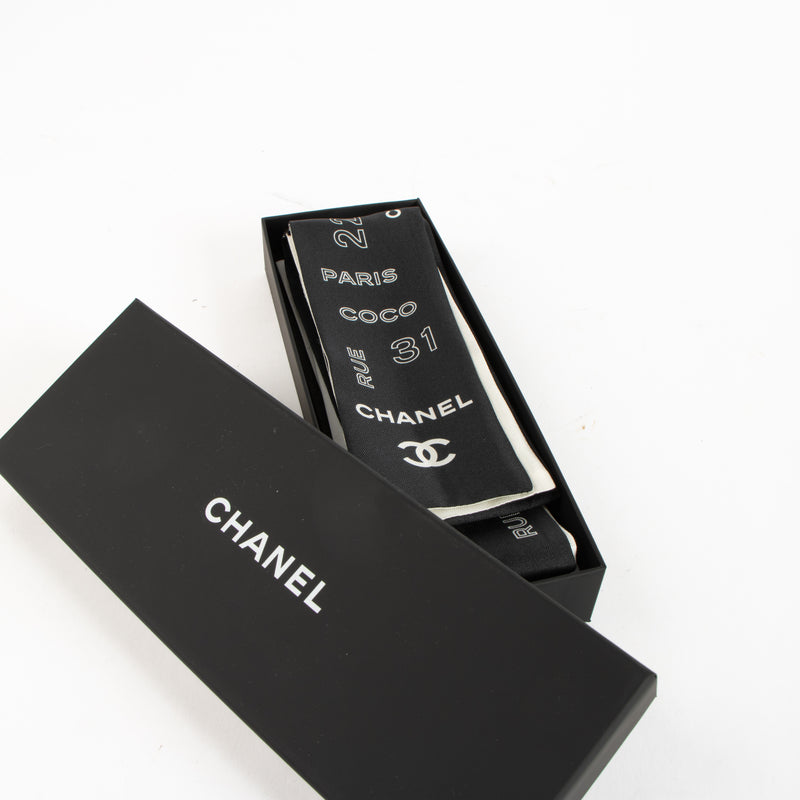 Shop the authentic Chanel Black/White Bandeau Scarf on Labellov.com !