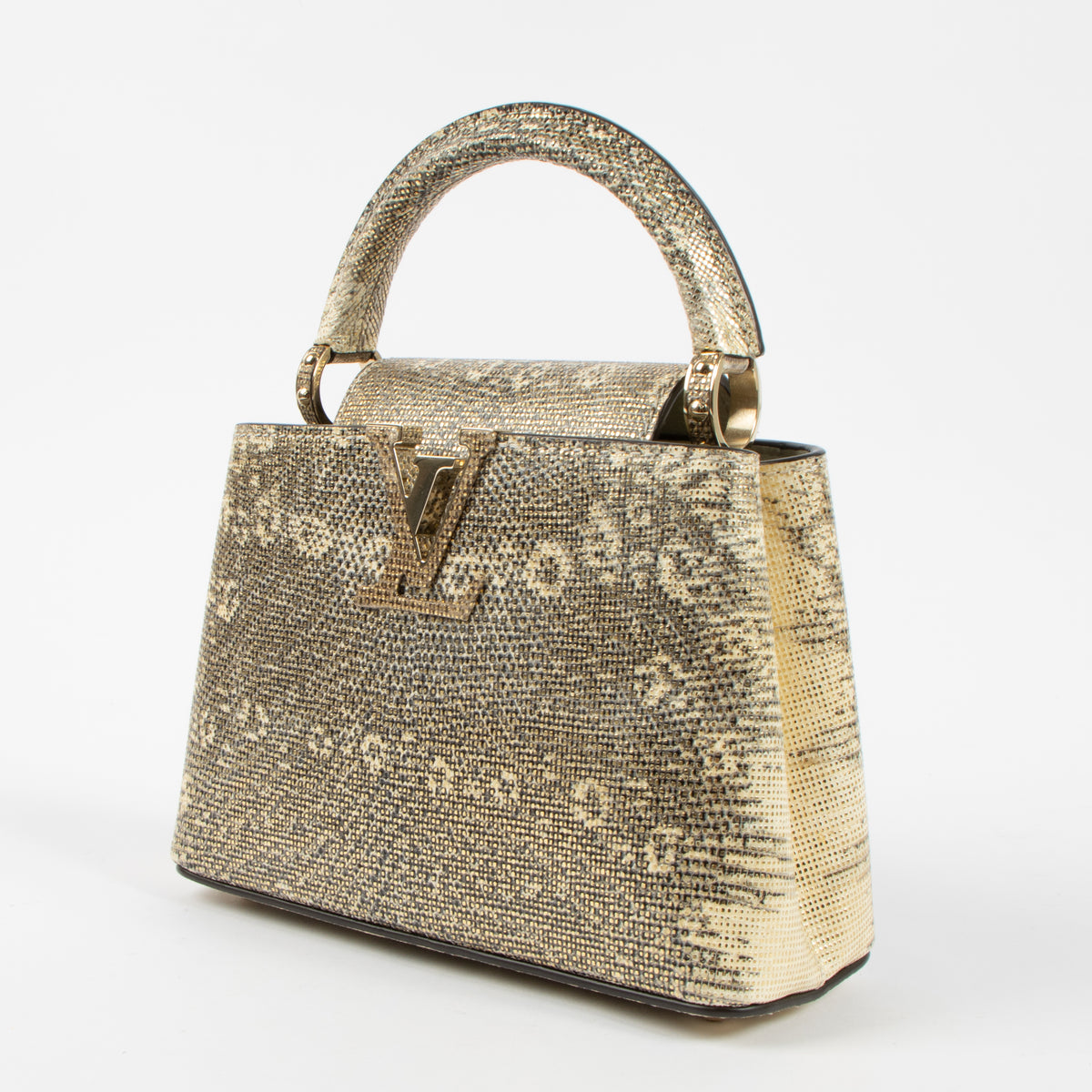 Shop the authentic Louis Vuitton Gold Lizard Capucines Mini second hand on Labellov.com!