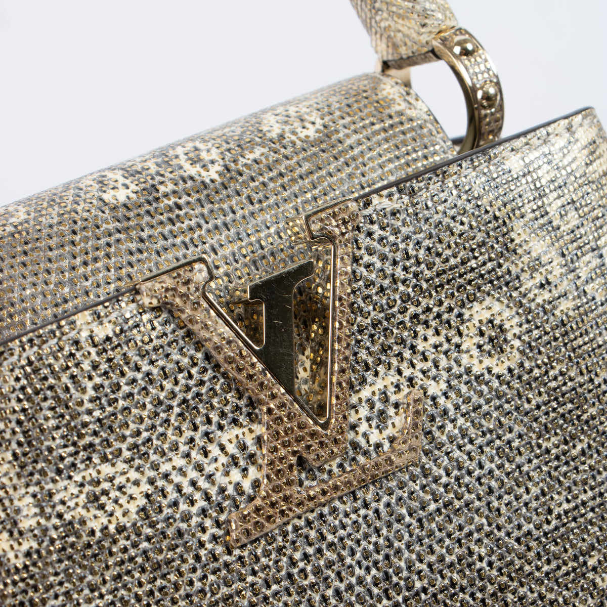 Shop the authentic Louis Vuitton Gold Lizard Capucines Mini second hand on Labellov.com!