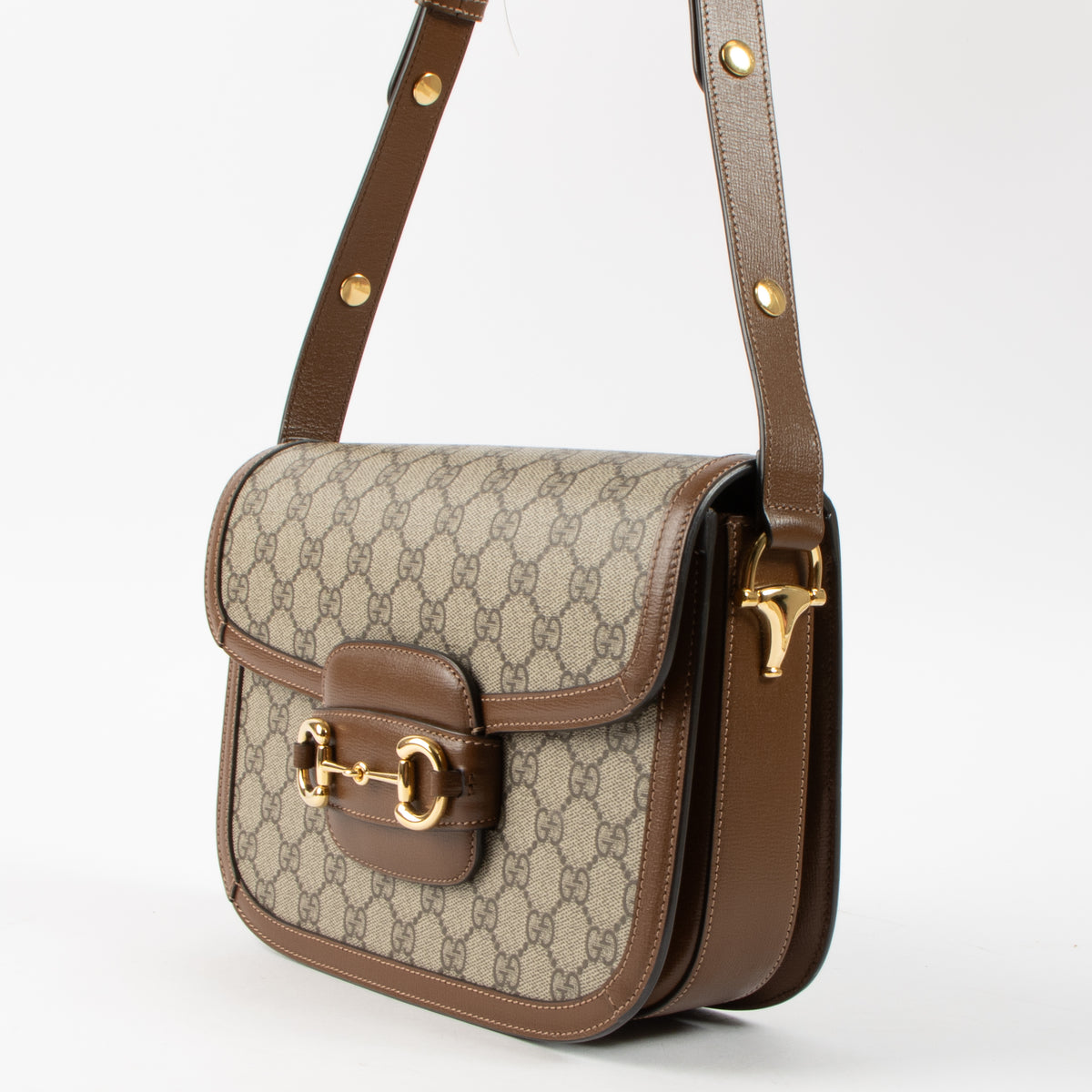 Shop this authentic Gucci GG Supreme Horsebit 1955 Medium Bag pre-loved on Labellov.com 