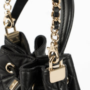 Shop the authentic Chanel 26P Black Mini Bucket Bag With Chain second hand on Labellov.com