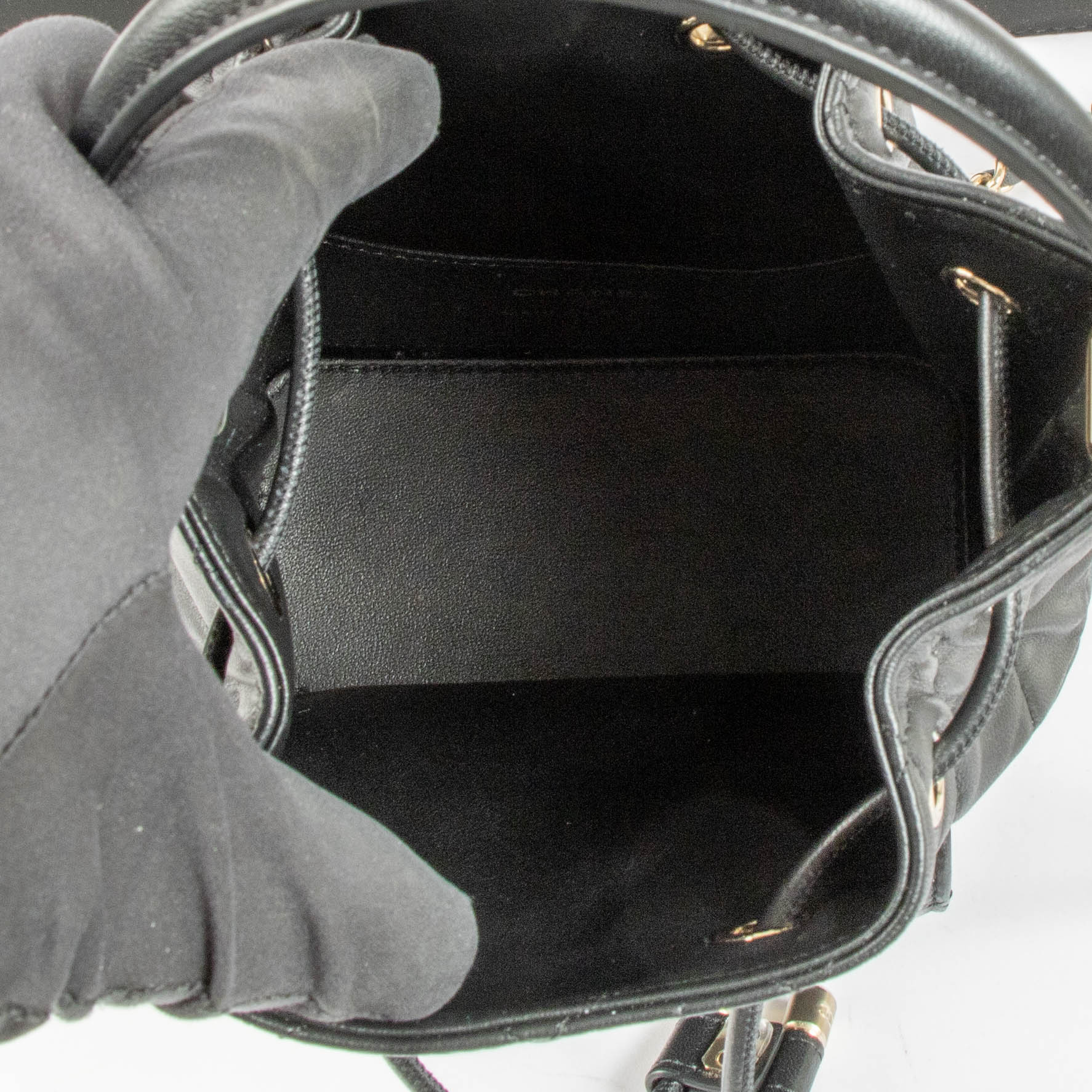 Shop the authentic Chanel 26P Black Mini Bucket Bag With Chain second hand on Labellov.com