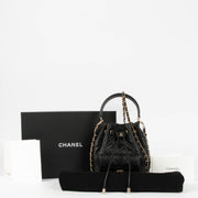 Shop the authentic Chanel 26P Black Mini Bucket Bag With Chain second hand on Labellov.com