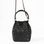 Shop the authentic Chanel 26P Black Mini Bucket Bag With Chain second hand on Labellov.com
