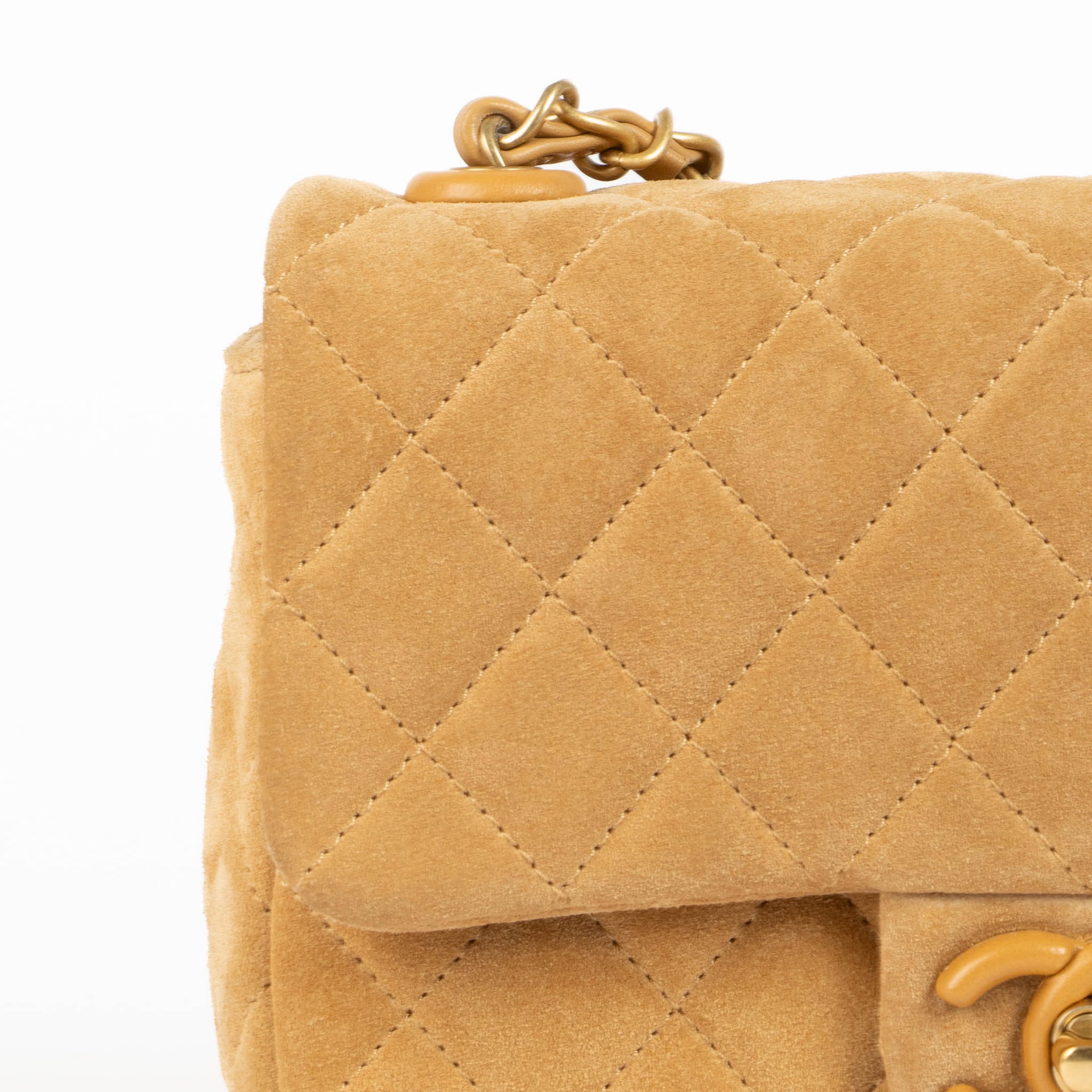 Shop this 100% authentic Chanel Beige Suede Mini Flap Bag at Labellov.com