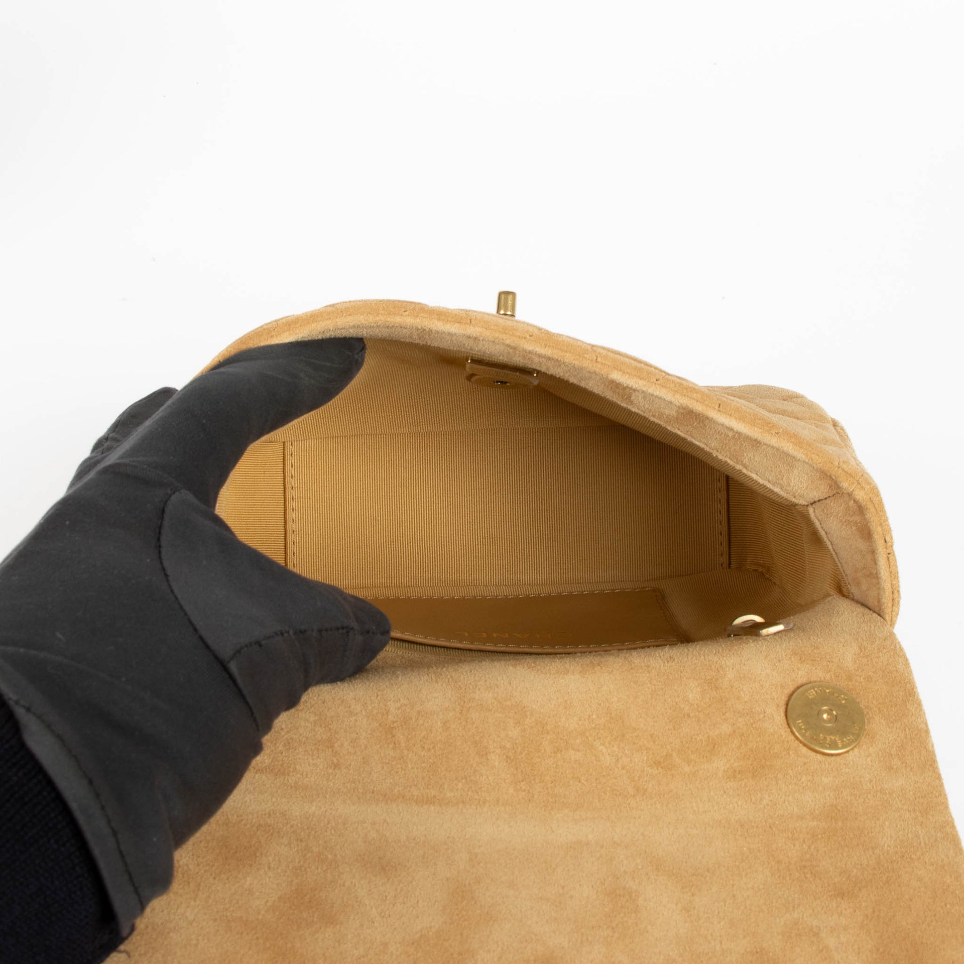 Shop this 100% authentic Chanel Beige Suede Mini Flap Bag at Labellov.com