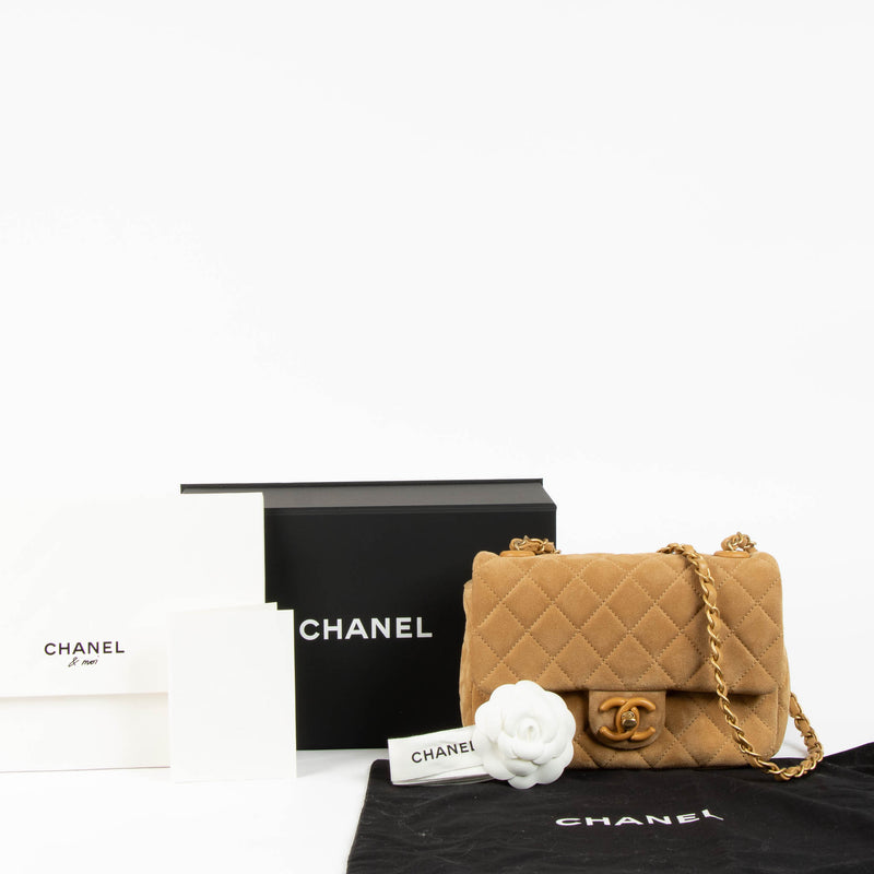 Shop this 100% authentic Chanel Beige Suede Mini Flap Bag at Labellov.com