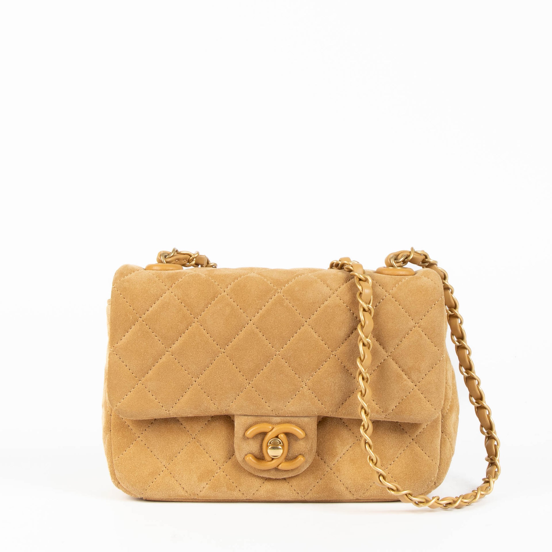 Shop this 100% authentic Chanel Beige Suede Mini Flap Bag at Labellov.com