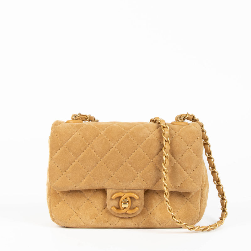 Shop this 100% authentic Chanel Beige Suede Mini Flap Bag at Labellov.com
