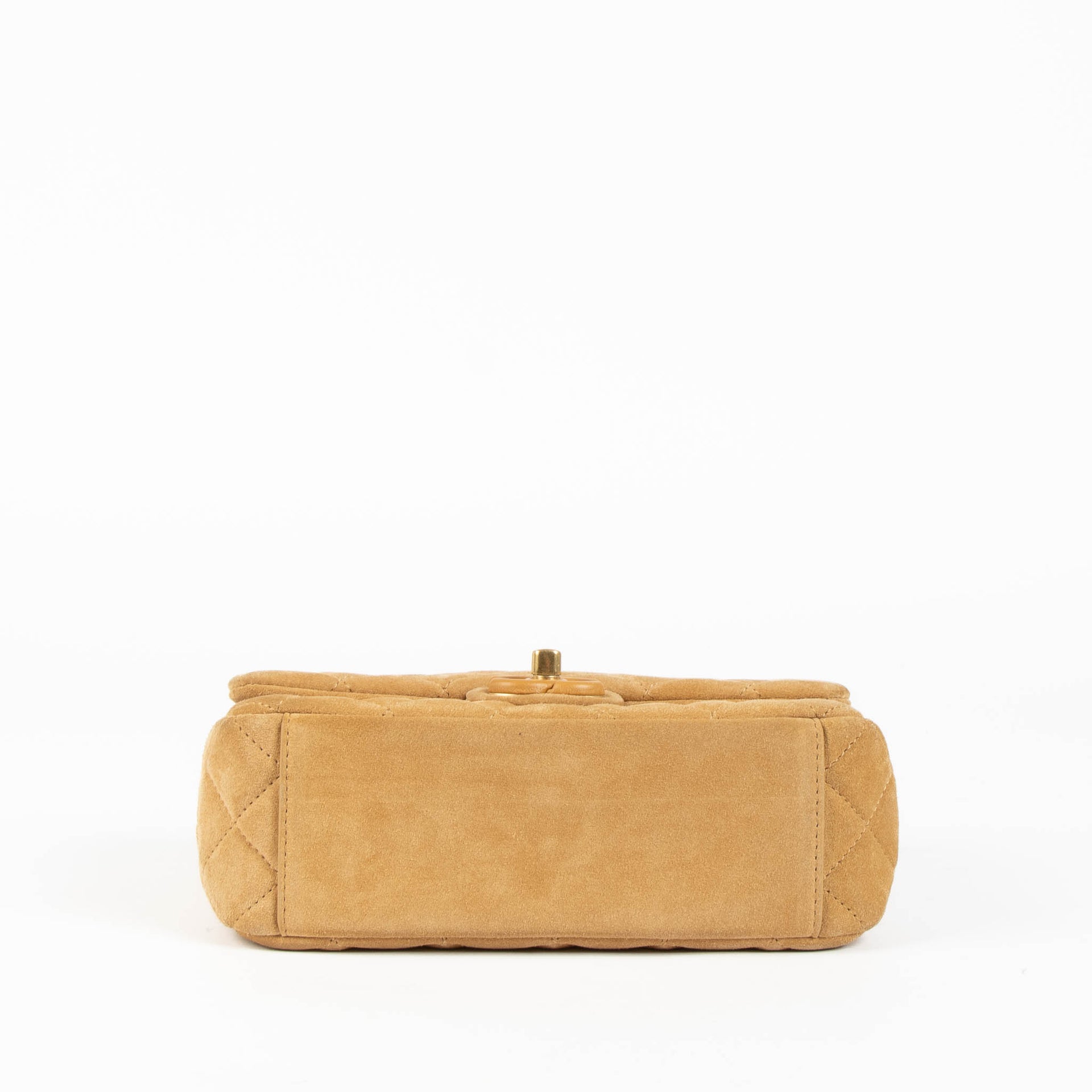 Shop this 100% authentic Chanel Beige Suede Mini Flap Bag at Labellov.com