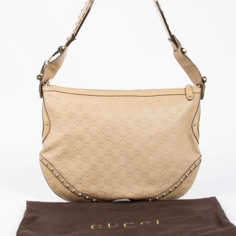 Shop this authentic Gucci Beige Guccissima Pelham Medium Hobo pre-loved on Labellov.com