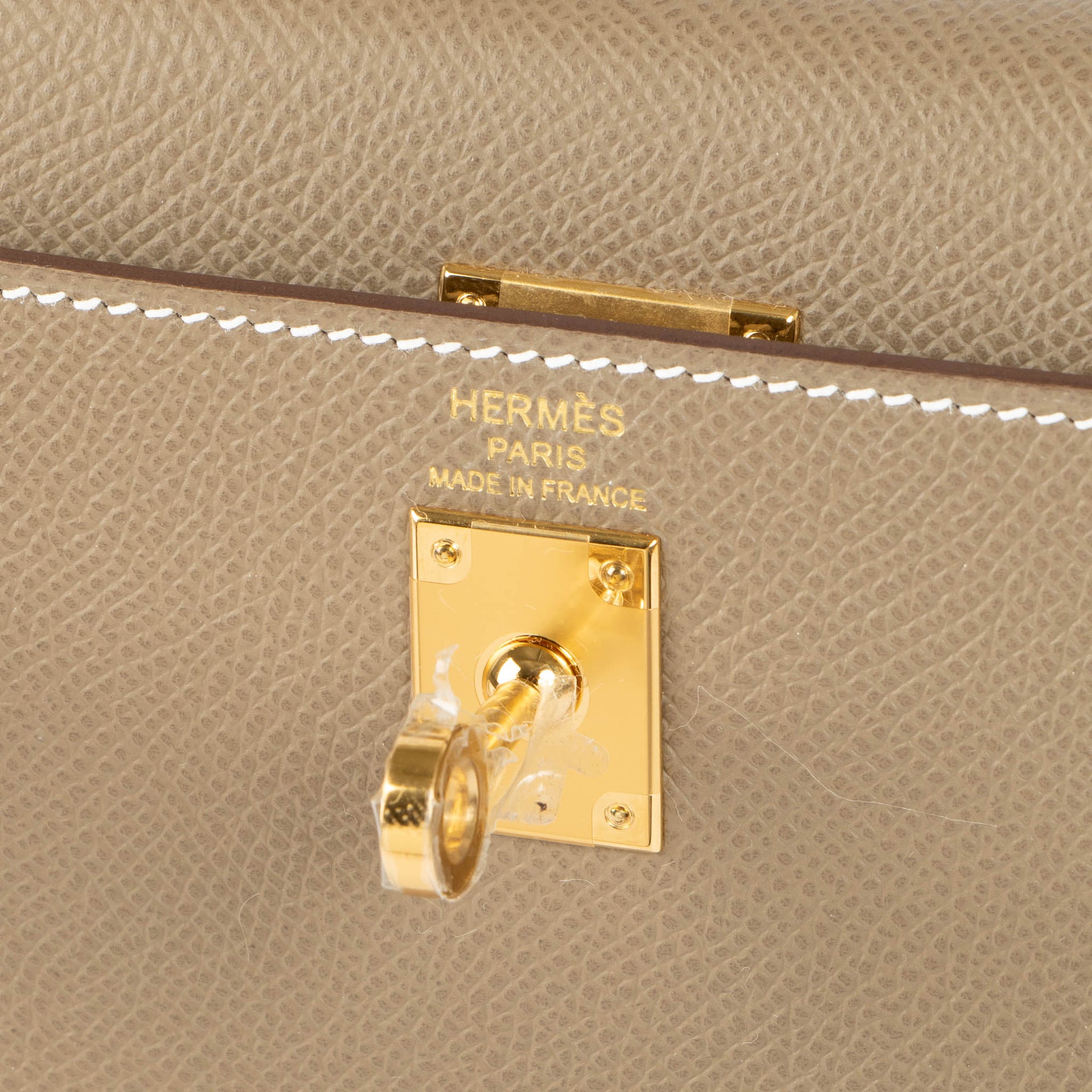 Shop the authentic Hermès Kelly II 25 Epsom Etoupe GHW brand-new on Labellov.com
