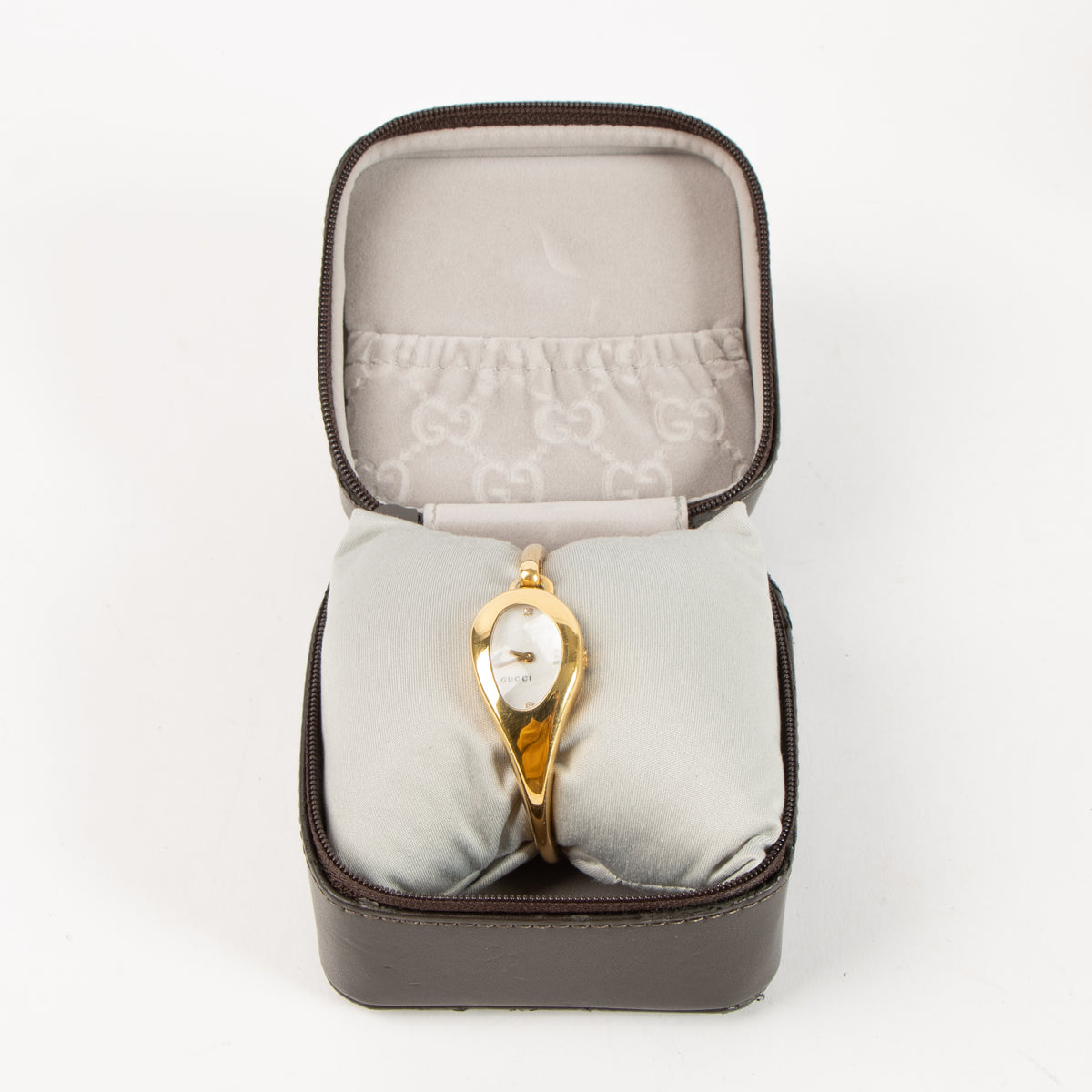 Shop this authentic Gucci Gold-Tone Oval Bangle Watch pre-loved on Labellov.com