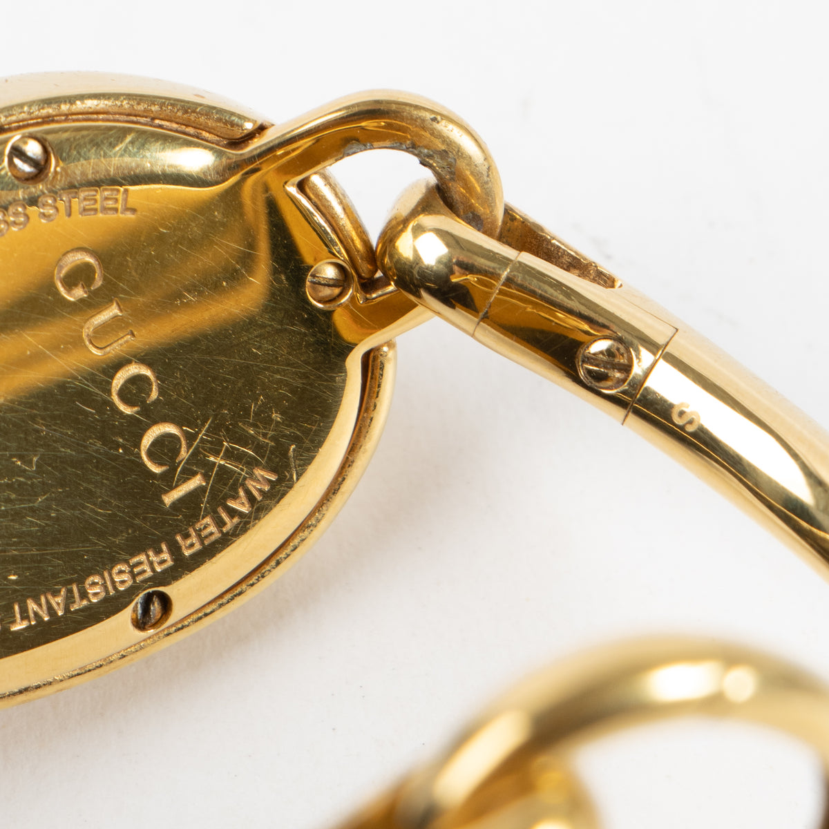 Shop this authentic Gucci Gold-Tone Oval Bangle Watch pre-loved on Labellov.com