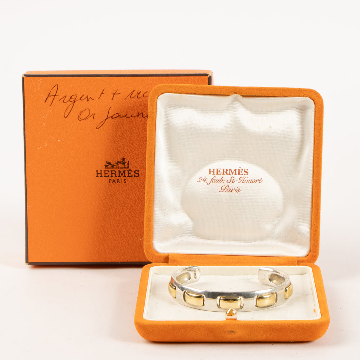 Shop this authentic Hermes Vintage Sterling Silver/Gold Bangle Bracelet Pre-Loved on Labellov.com
