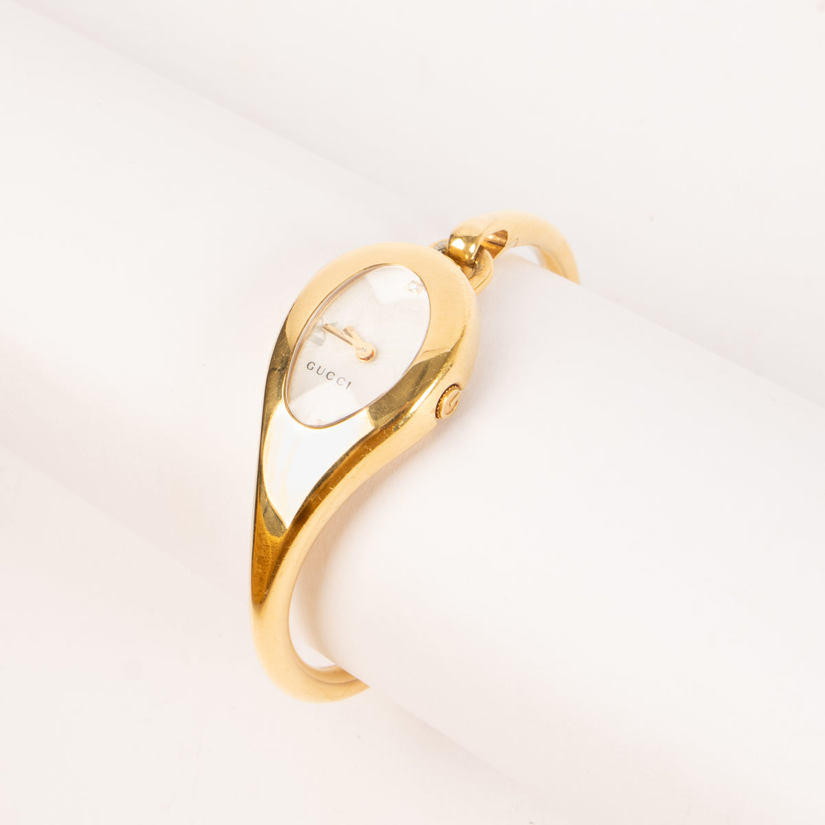 Shop this authentic Gucci Gold-Tone Oval Bangle Watch pre-loved on Labellov.com