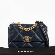 Shop this 100% authentic Chanel Navy Lambskin Small Chanel 19 Bag at Labellov.com