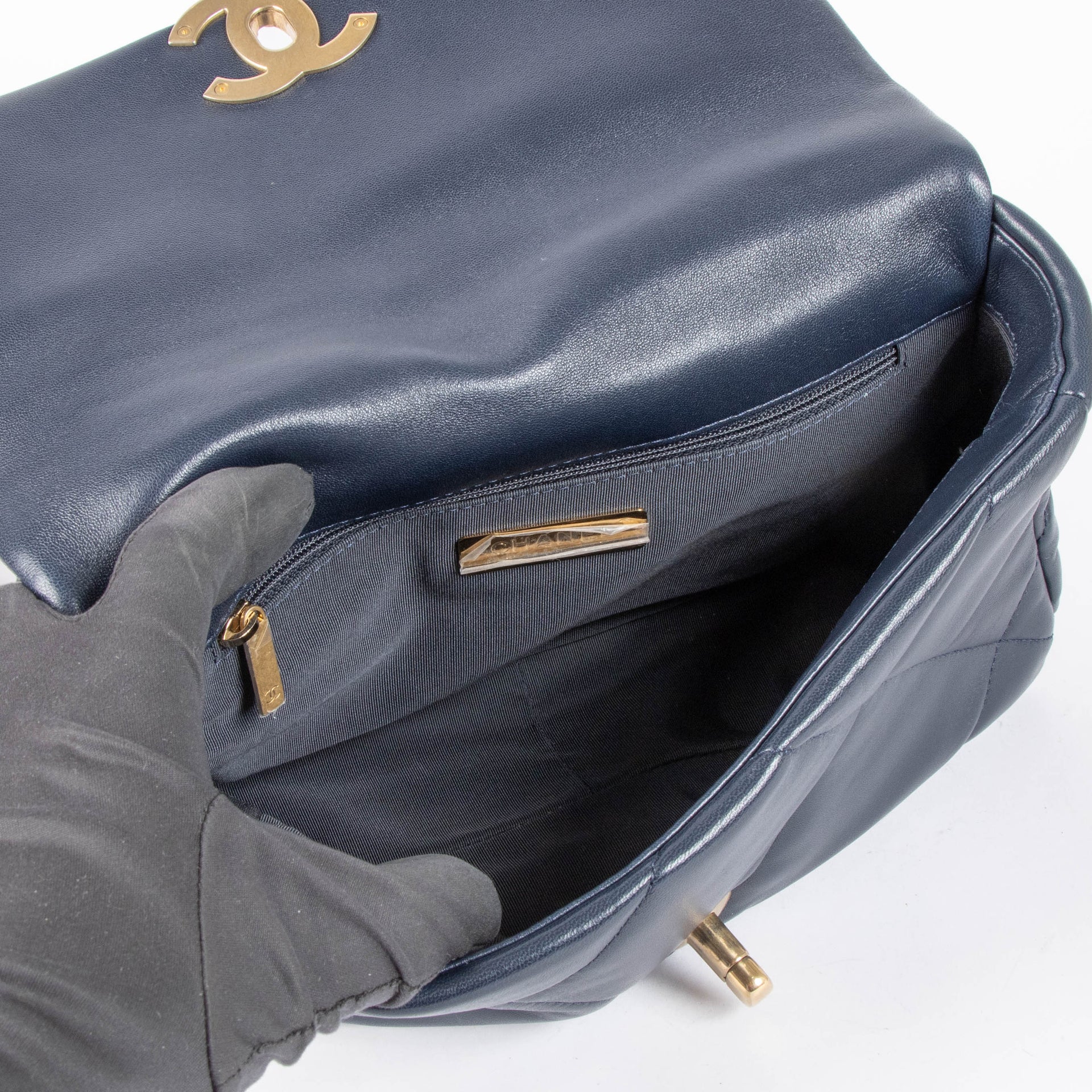 Shop this 100% authentic Chanel Navy Lambskin Small Chanel 19 Bag at Labellov.com