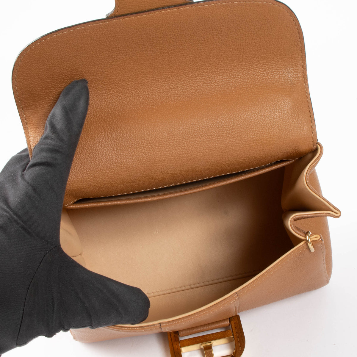 Shop this authentic Delvaux Cognac Brillant Mini pre-loved on Labellov.com