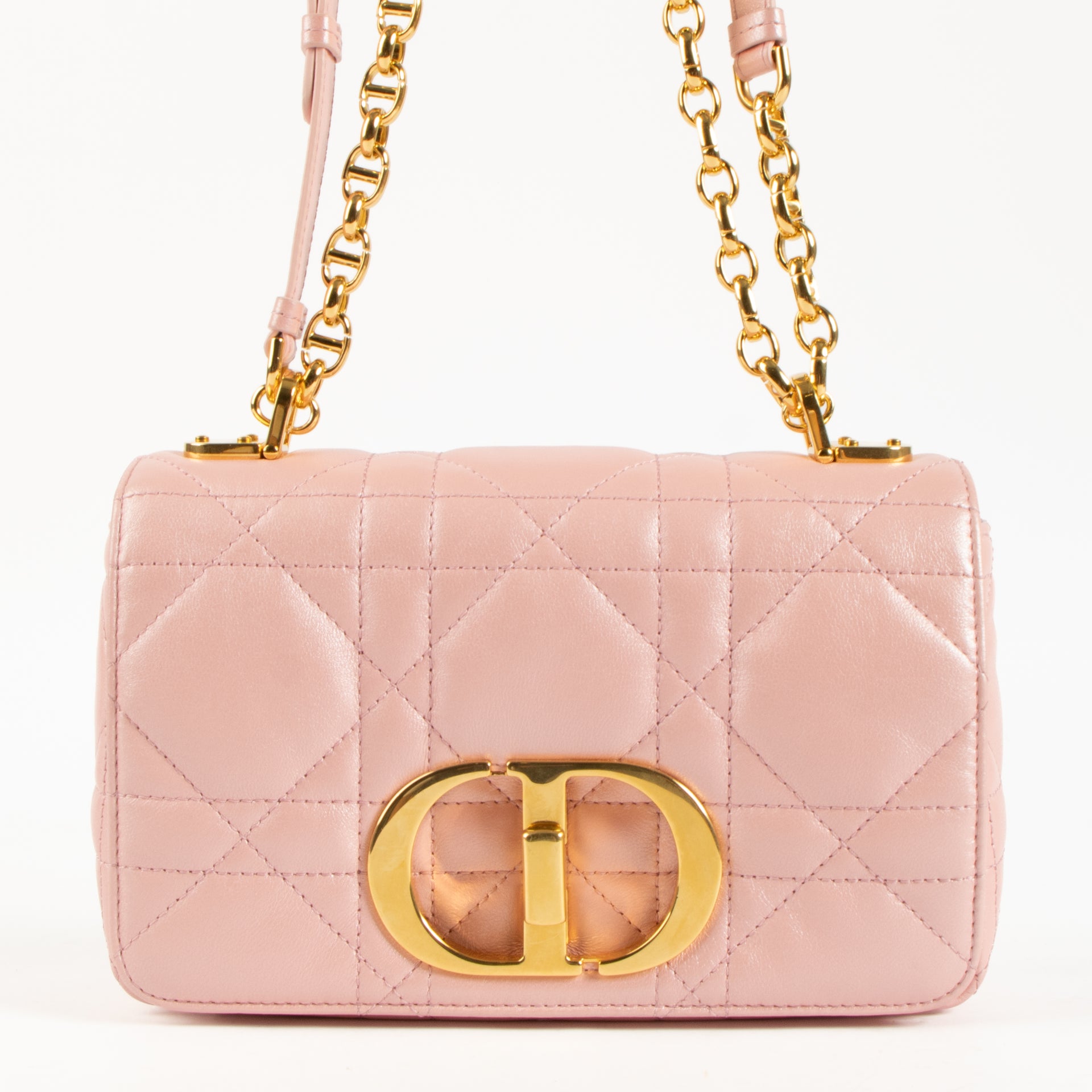 Shop the authentic Christian Dior Pearly Pink Cannage Small Caro Bag on Labellov.com !