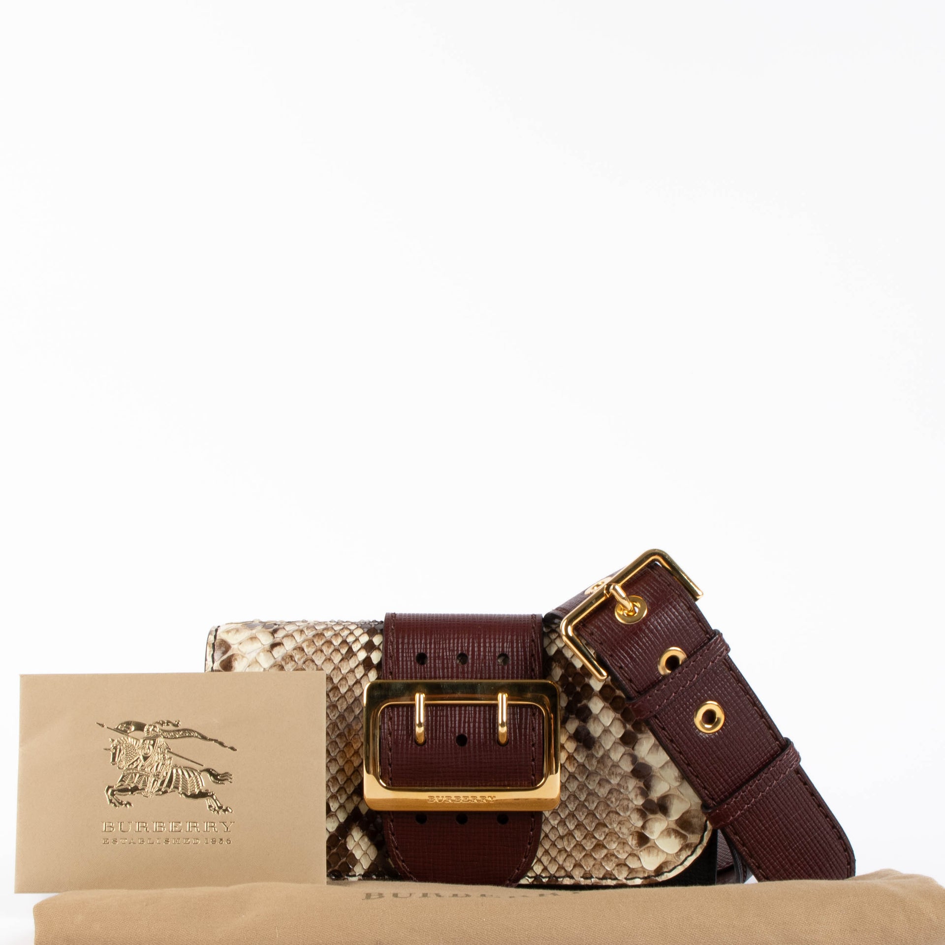 Shop this authentic Burberry Python Small Madison bag pre-loved on Labellov.com 