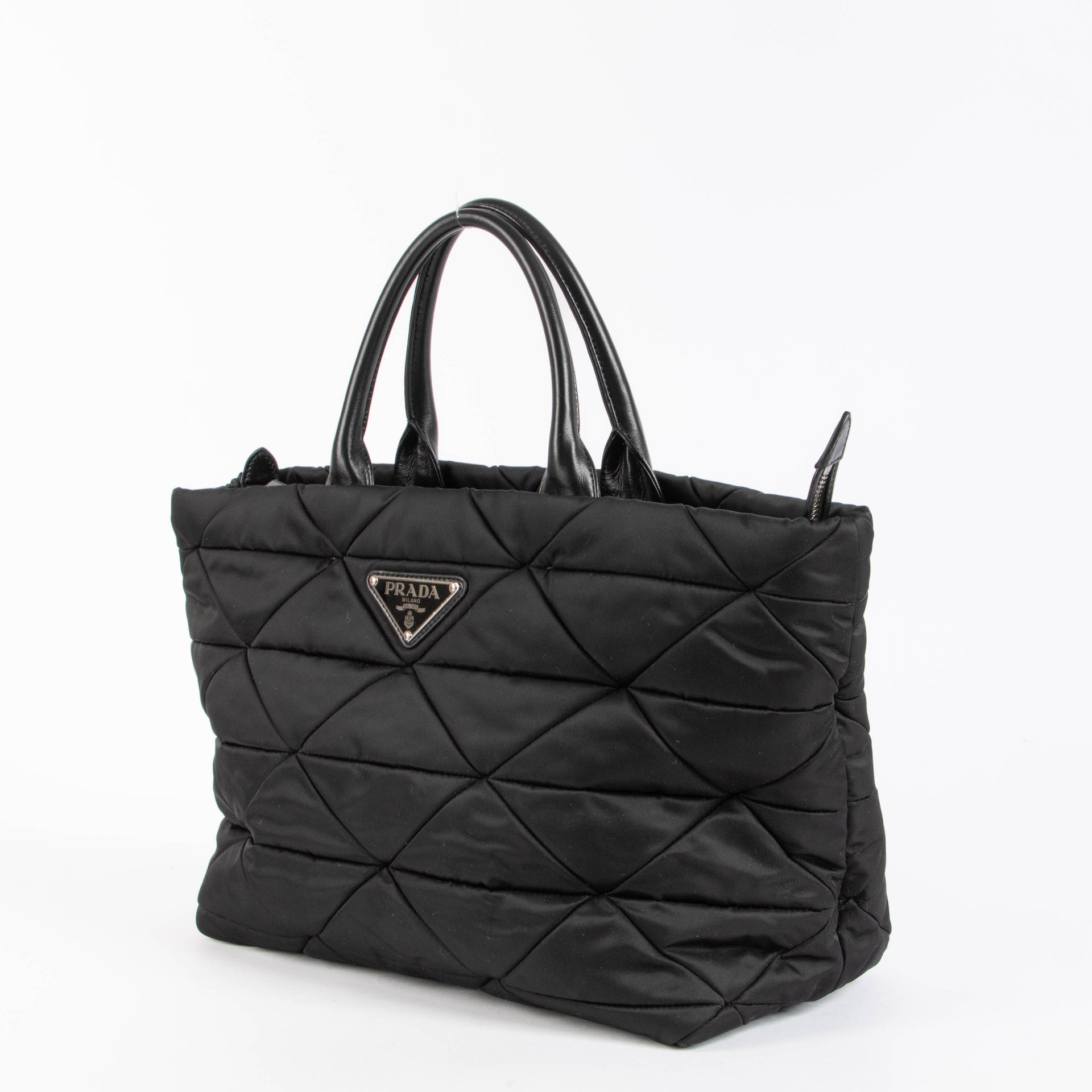 Shop this authentic Prada Black Nylon Padded Tote bag pre-loved on Labellov.com 