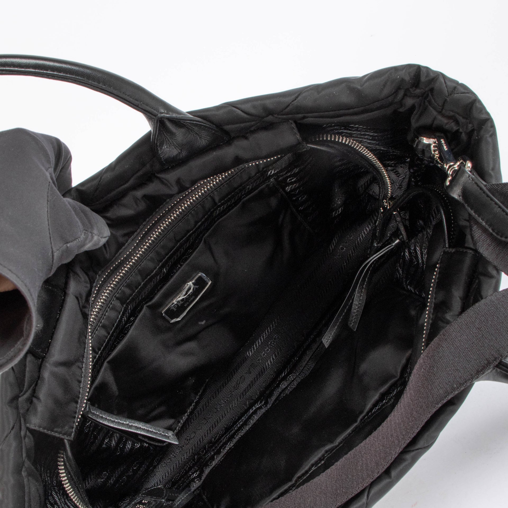 Shop this authentic Prada Black Nylon Padded Tote bag pre-loved on Labellov.com 