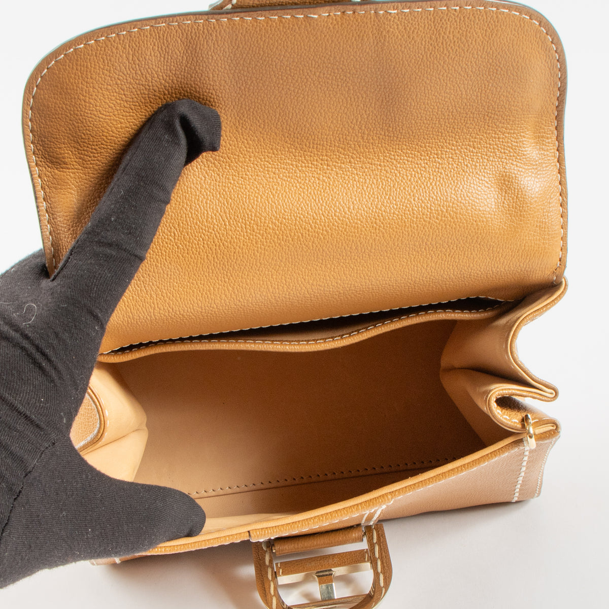 Shop the 100% authentic Delvaux Vegetal Rodeo Calf Brillant Mini Surpiqué second hand on Labellov.com!