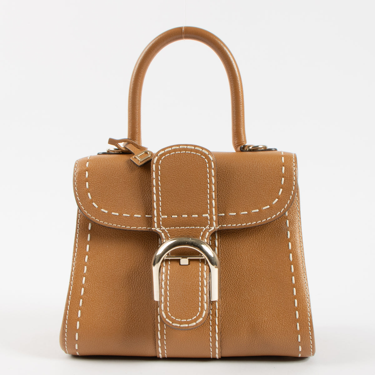 Shop the 100% authentic Delvaux Vegetal Rodeo Calf Brillant Mini Surpiqué second hand on Labellov.com!