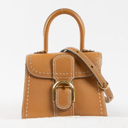 Shop the authentic Delvaux Vegetal Rodeo Calf Brillant Mini Bag second hand on Labellov.com!