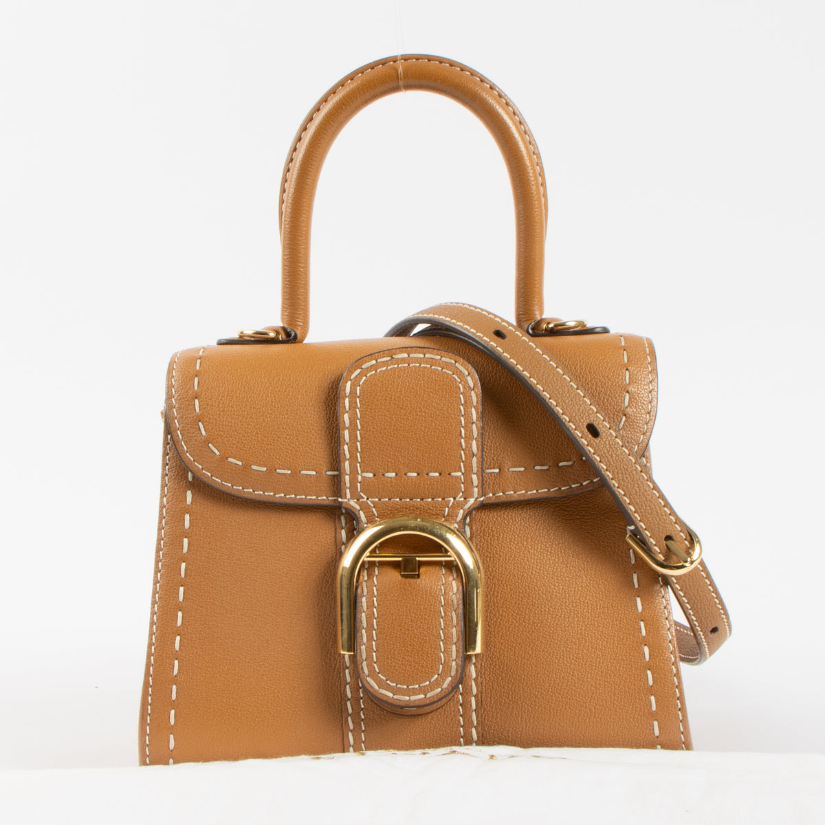 Shop the authentic Delvaux Vegetal Rodeo Calf Brillant Mini Bag second hand on Labellov.com!