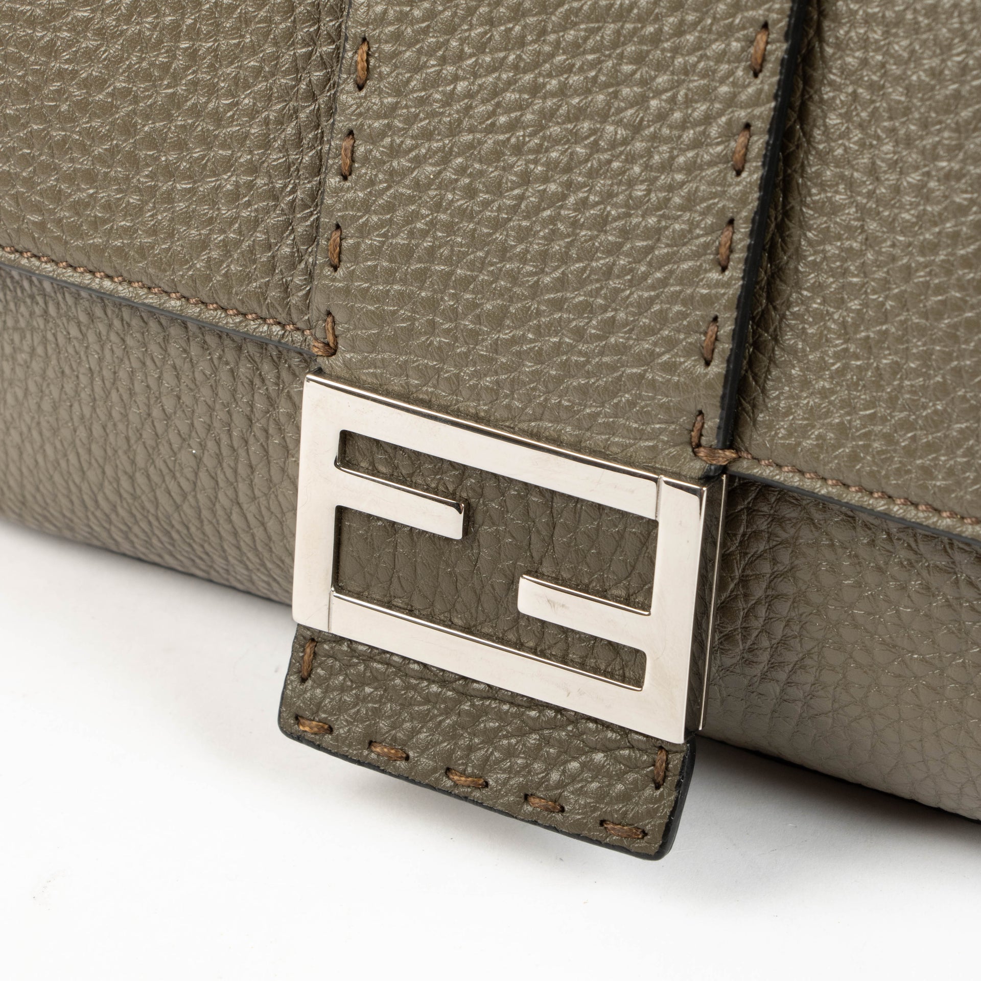 Shop this authentic Fendi Military Green Baguette Bag pre-loved on Labellov.com 