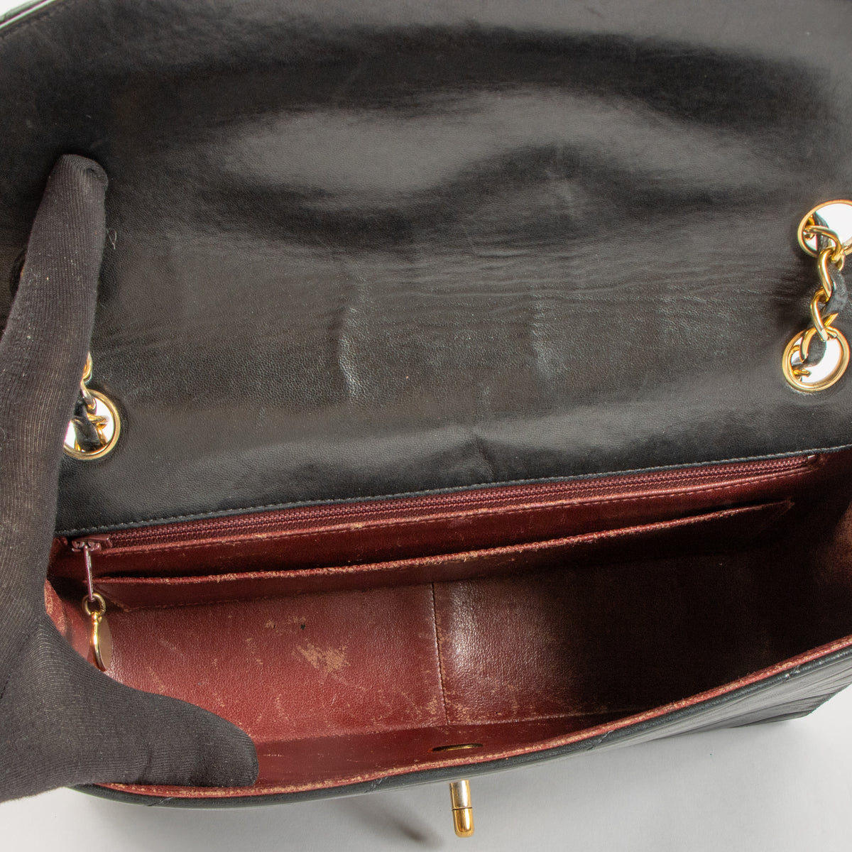 Shop the Chanel Vintage Black Lambskin Flap Bag in good condition at Labellov. A timeless vintage Chanel classic with iconic design.
