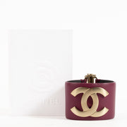 Shop the authentic Chanel 18C Burgundy Leather CC Cuff Bracelet on Labellov.com !