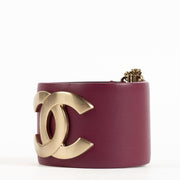Shop the authentic Chanel 18C Burgundy Leather CC Cuff Bracelet on Labellov.com !