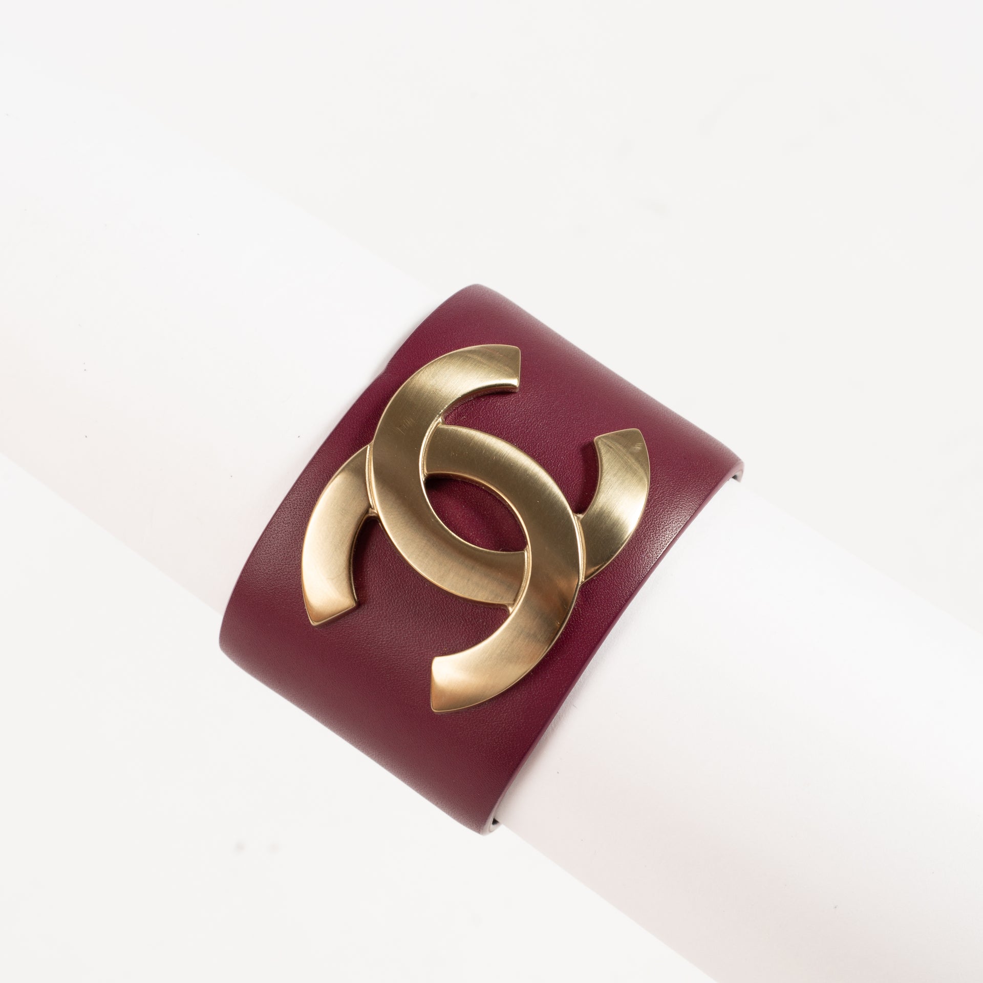Shop the authentic Chanel 18C Burgundy Leather CC Cuff Bracelet on Labellov.com !