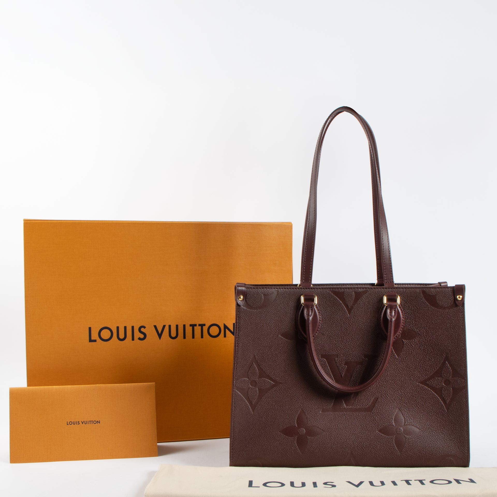 Louis Vuitton Wine Monogram Empreinte Onthego MM Bag