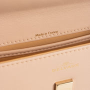 Shop the authentic Delvaux Nude Camaieux Calf Souple Tempête Mini Bag second hand on Labellov.com!
