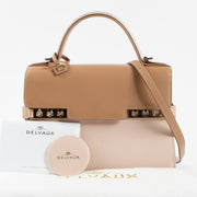 Shop the authentic Delvaux Nude Camaieux Calf Souple Tempête Mini Bag second hand on Labellov.com!
