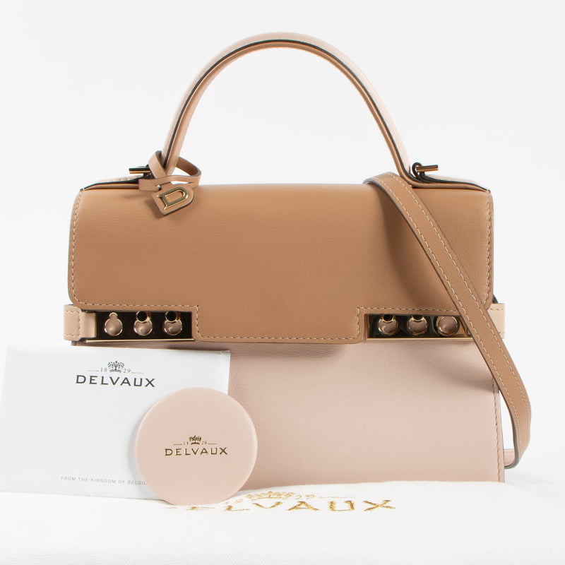 Shop the authentic Delvaux Nude Camaieux Calf Souple Tempête Mini Bag second hand on Labellov.com!
