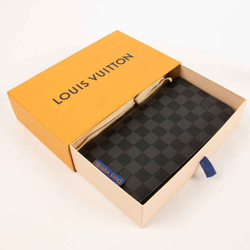 Shop this authentic Louis Vuitton Damier Graphite Zippy Vertical Wallet Pre-Loved on Labellov.com