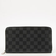Shop this authentic Louis Vuitton Damier Graphite Zippy Vertical Wallet Pre-Loved on Labellov.com
