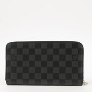 Shop this authentic Louis Vuitton Damier Graphite Zippy Vertical Wallet Pre-Loved on Labellov.com