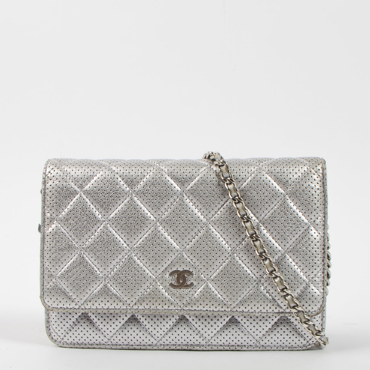 Shop the authentic Chanel Silver Perforated Classic Wallet On Chain Bag