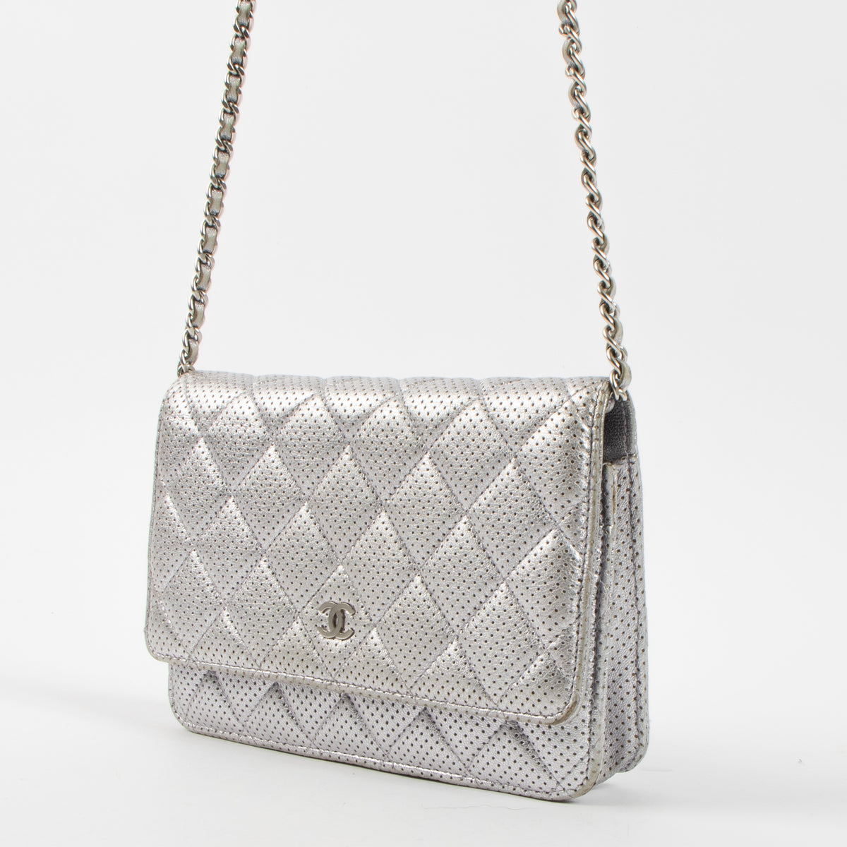 Shop the authentic Chanel Silver Perforated Classic Wallet On Chain Bag