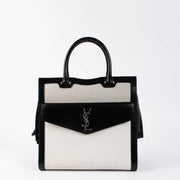 Shop the authentic Saint Laurent Black & White Canvas/Leather Uptown Tote Bag second hand on Labellov.com