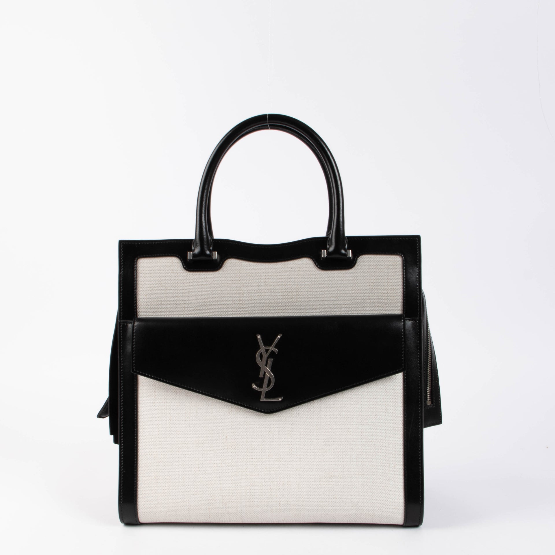 Shop the authentic Saint Laurent Black & White Canvas/Leather Uptown Tote Bag second hand on Labellov.com