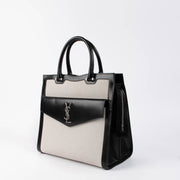 Shop the authentic Saint Laurent Black & White Canvas/Leather Uptown Tote Bag second hand on Labellov.com