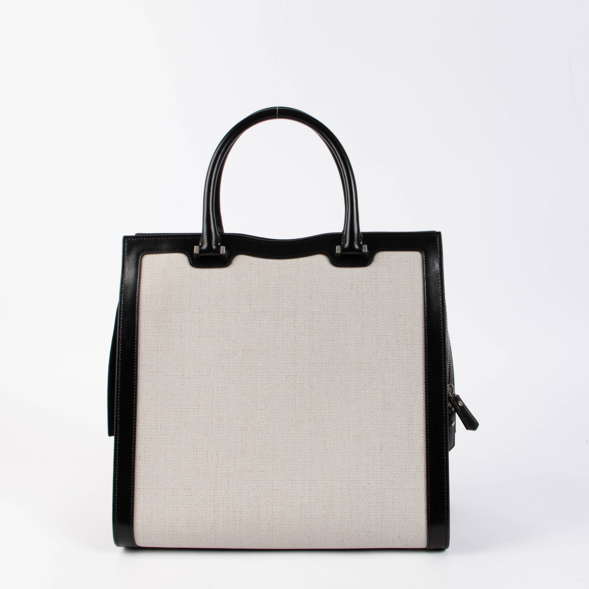Shop the authentic Saint Laurent Black & White Canvas/Leather Uptown Tote Bag second hand on Labellov.com