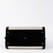 Shop the authentic Saint Laurent Black & White Canvas/Leather Uptown Tote Bag second hand on Labellov.com